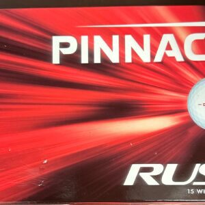 A box of pinnacle rush 1 5 golf balls