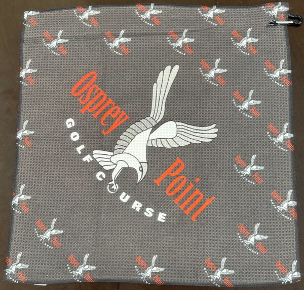 A close up of the back of a towel with an eagle on it